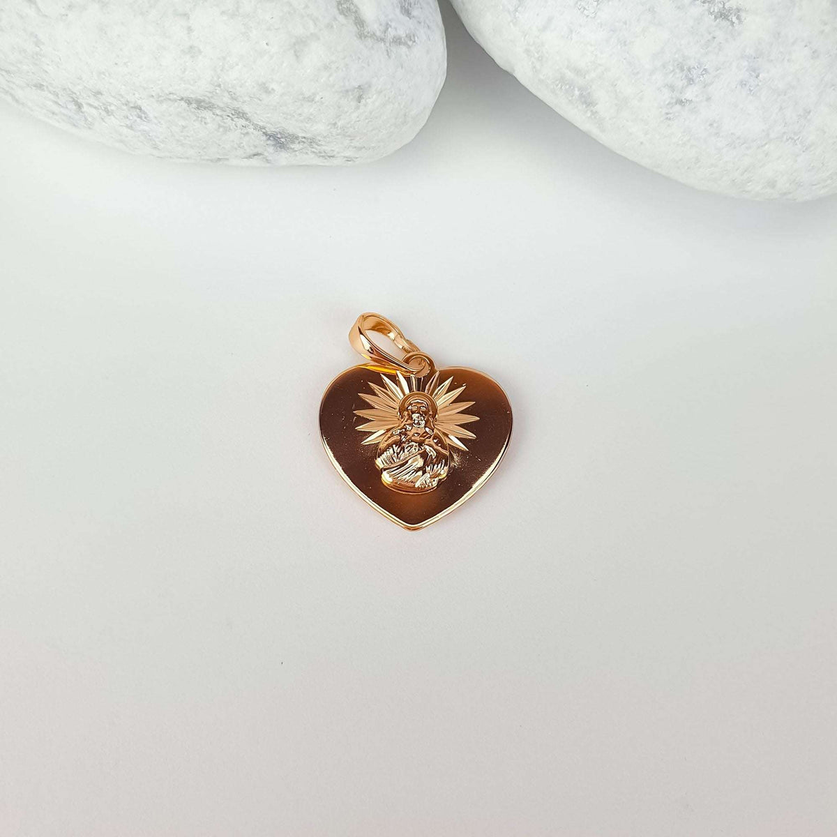 Smooth gold-tone heart pendant with the Virgin Mary in rays of light