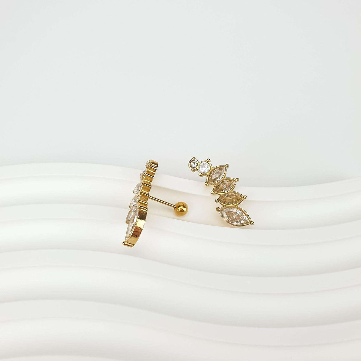Back of the earring with a ball screw back and gold-plated leaf detail