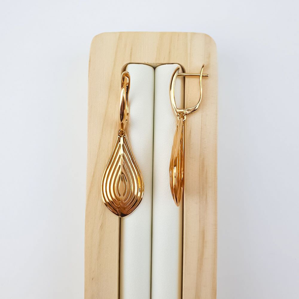 Long teardrop earrings on a wooden stand, front view and clasp from the side
