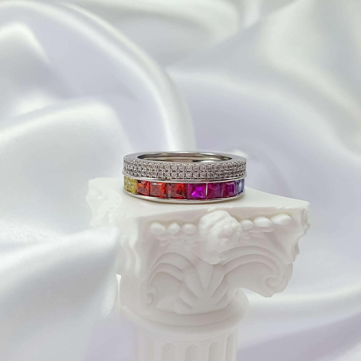 Side view of the ring with yellow, red and fuchsia square cubic zirconia