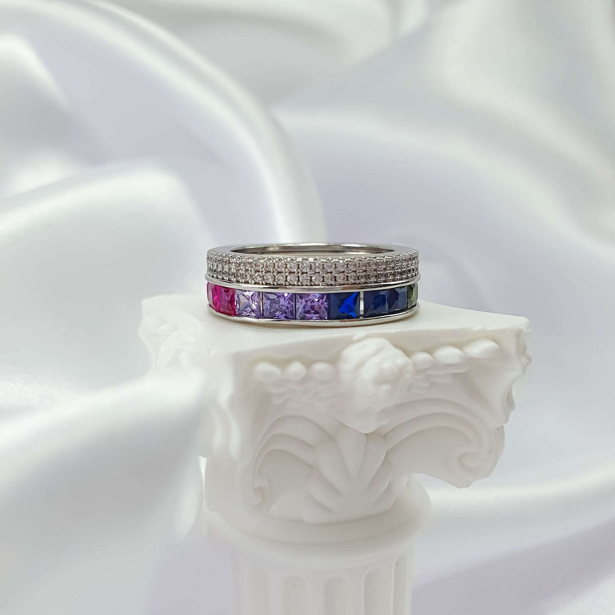 Multicoloured cubic zirconia ring from the front, pink, lilac and blue stones