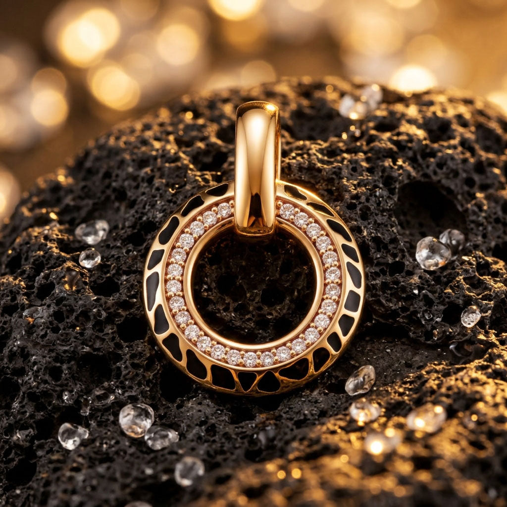 Macro shot of the pendant on black stone with scattered crystals and golden light