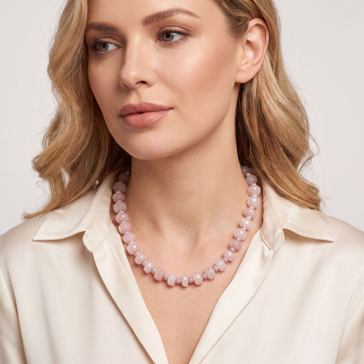 Soft pink geometric quartz bead necklace with textured details