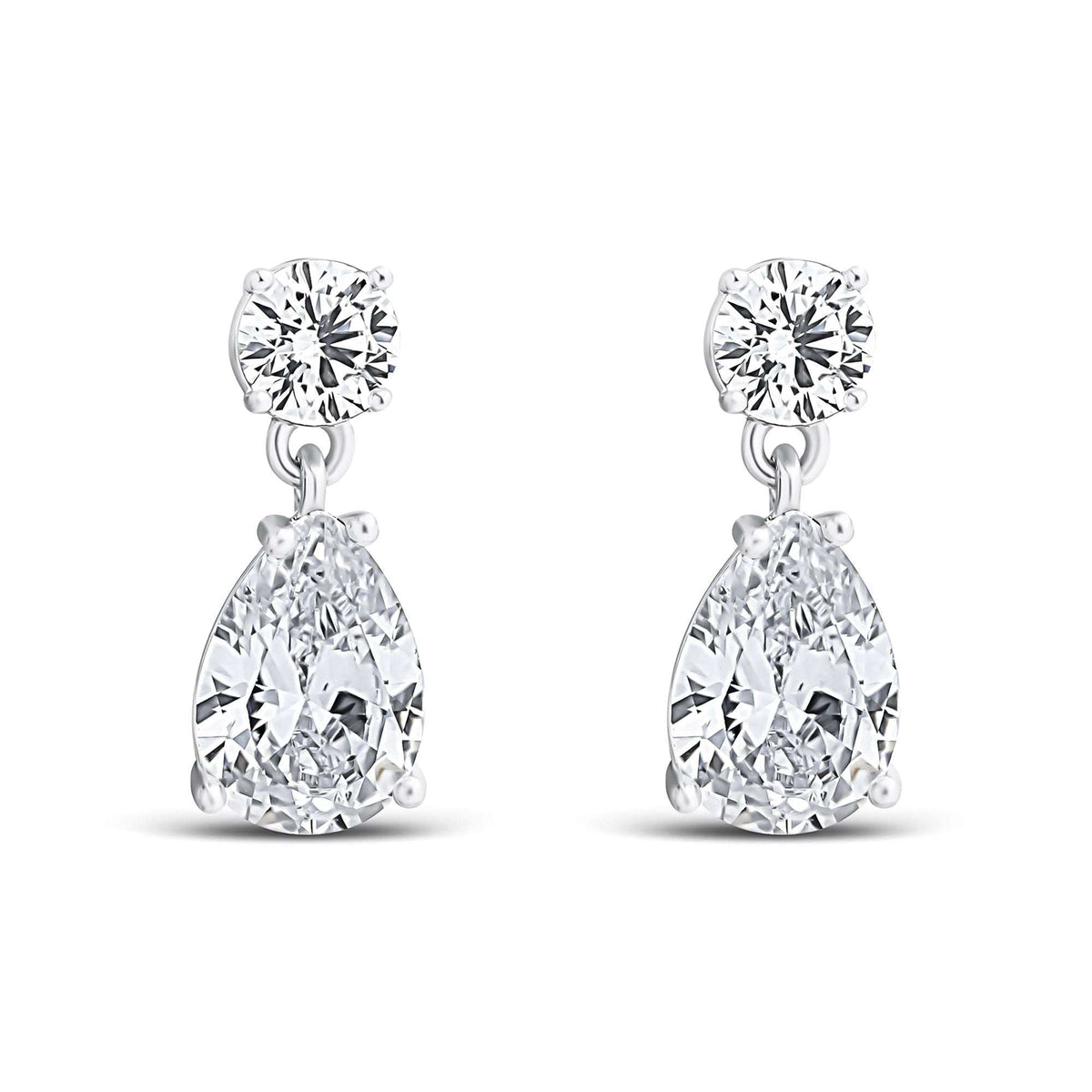 Teardrop cubic zirconia earrings with a round stone on top, on a white background