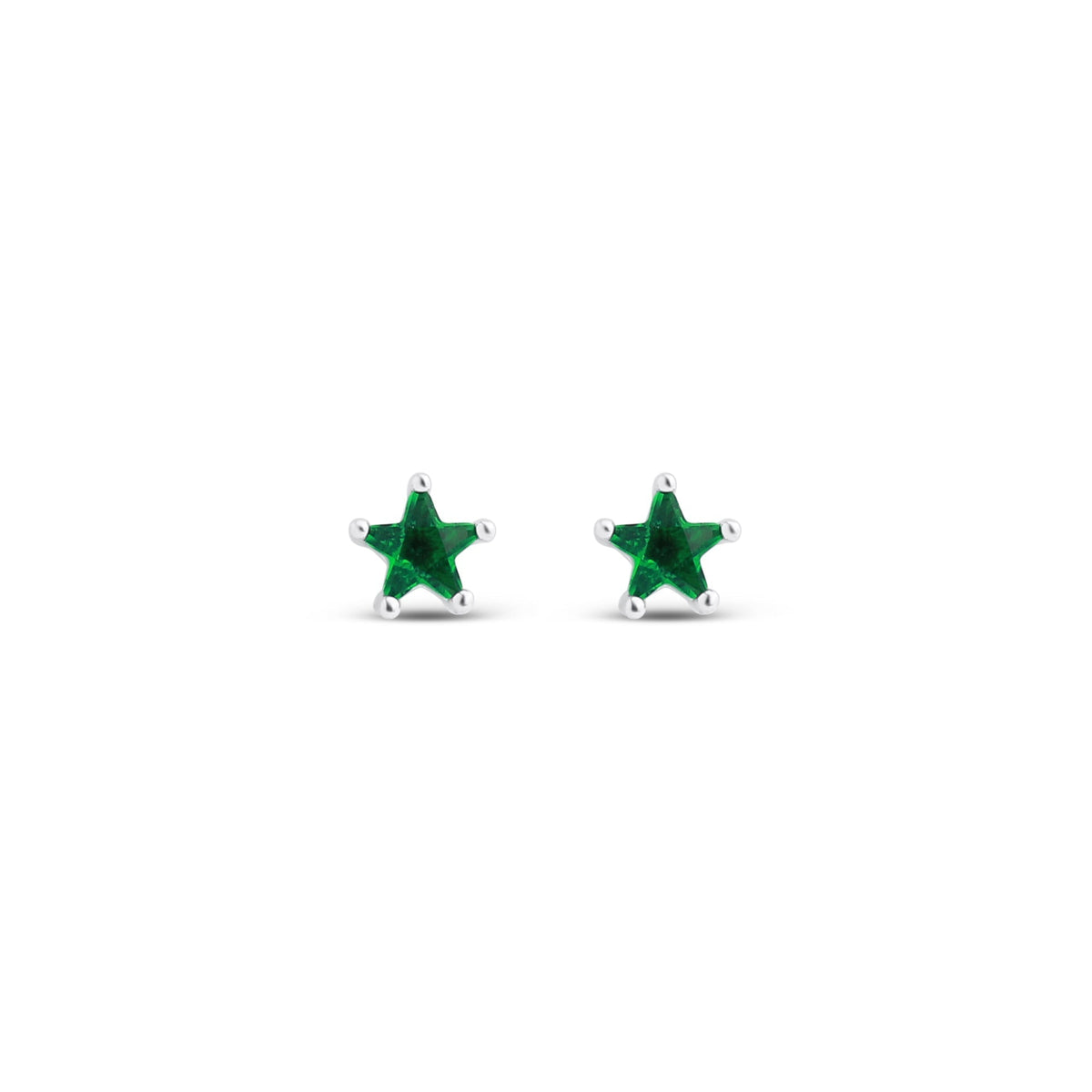 Star-shaped stud earrings with emerald green cubic zirconia on a white studio background