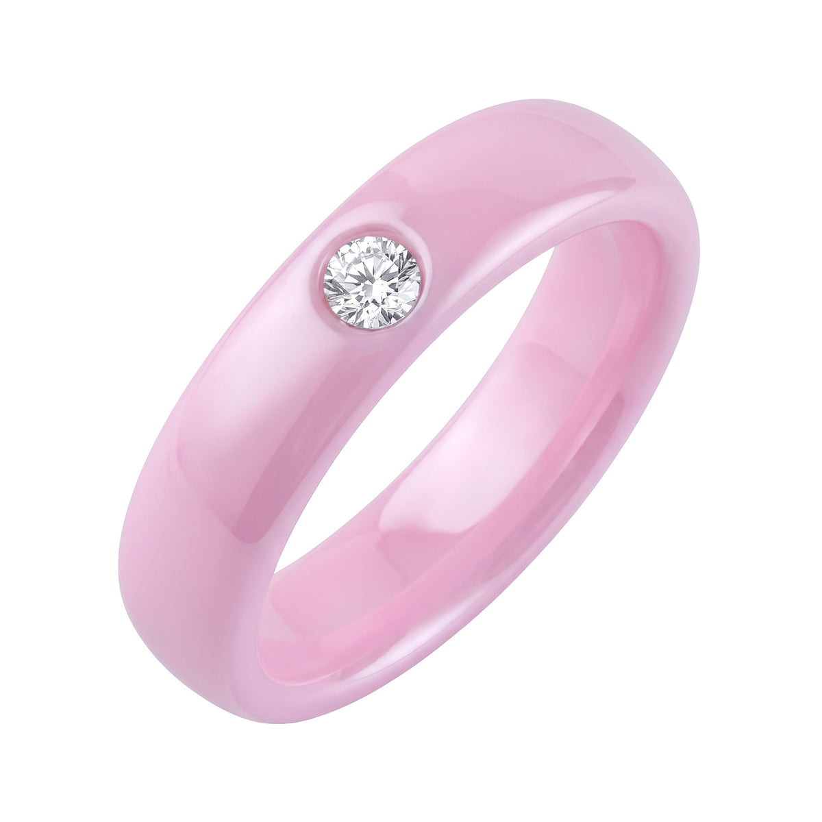 Pale pink ceramic ring with one round clear cubic zirconia and a smooth surface