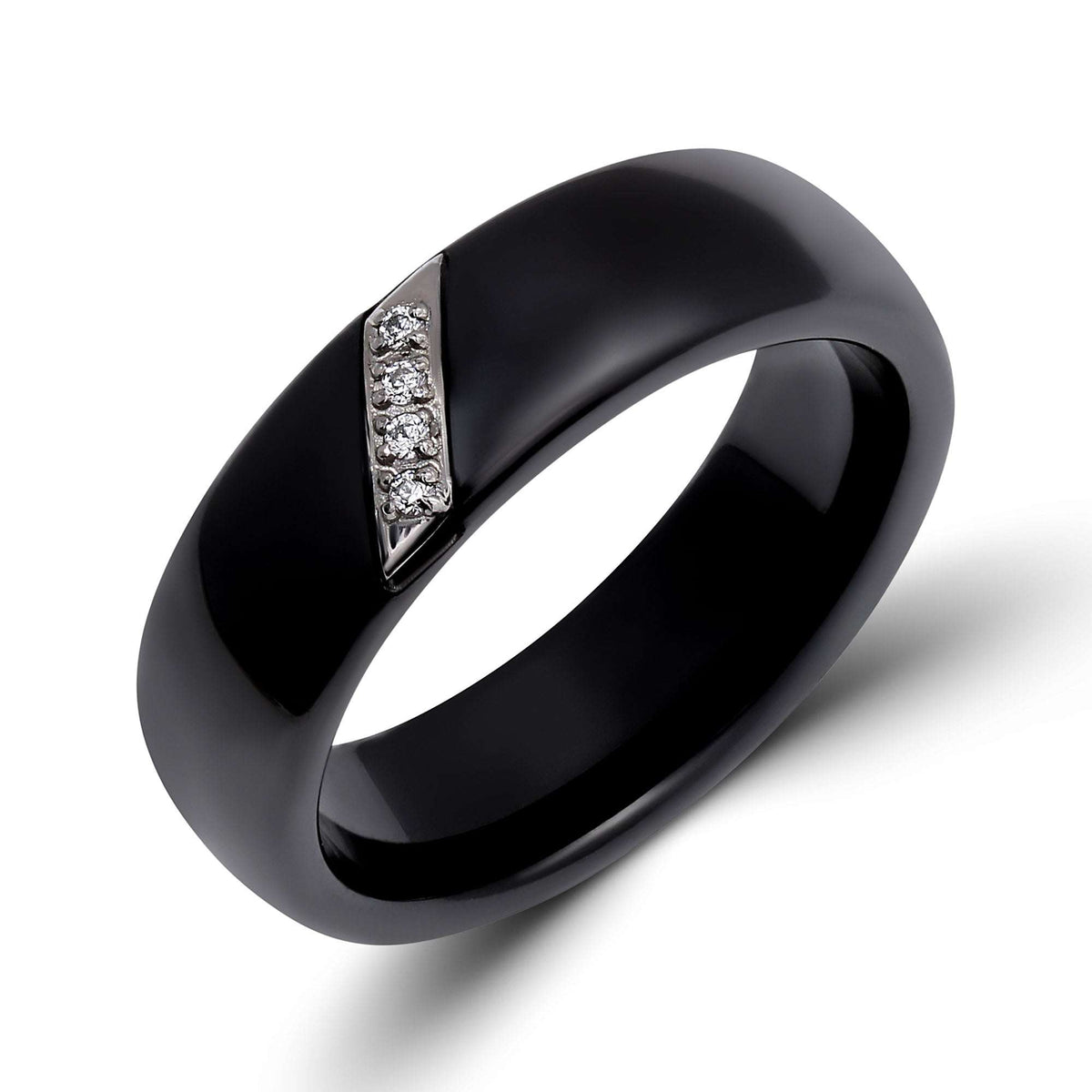 Glossy black ceramic ring with a slanted platinum-plated inlay of sparkling zirconia