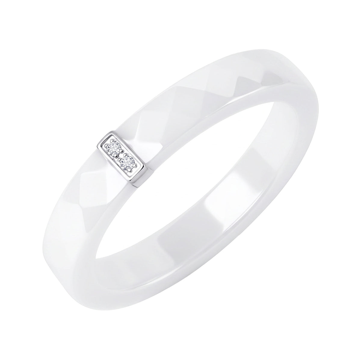 White ceramic ring with two small cubic zirconia in a silver-tone setting