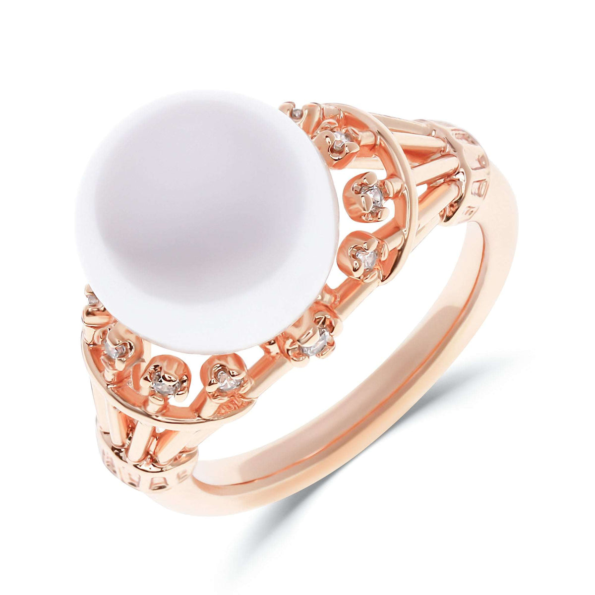 Gold-tone ring with a large white pearl-like stone and small cubic zirconia