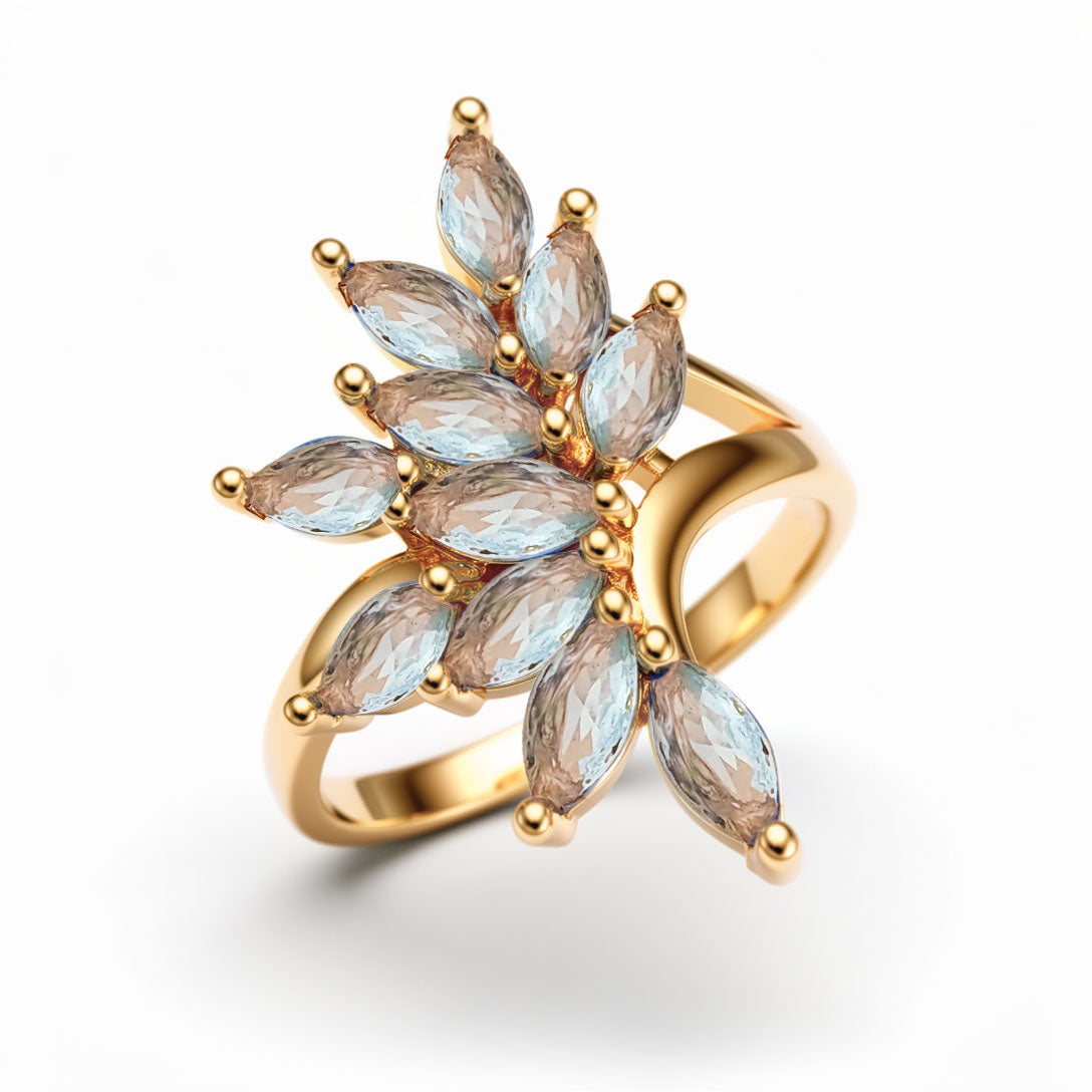 Ring with light blue marquise cubic zirconia in a branching fan