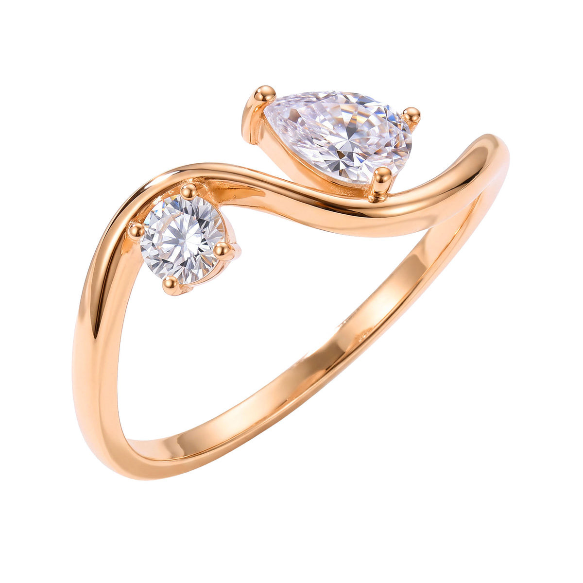 Asymmetric gold-plated ring with teardrop and round clear stones on a curved band