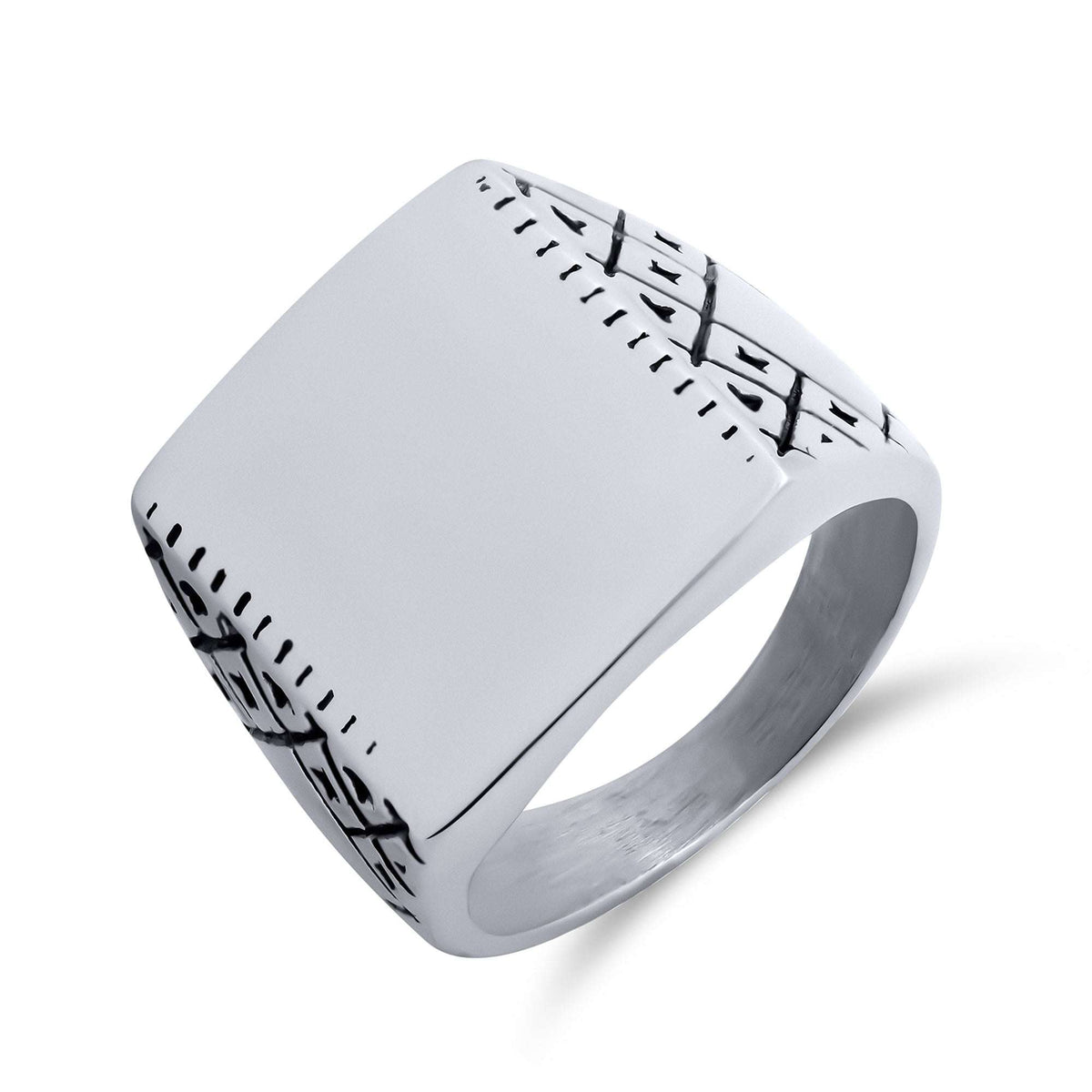Chunky steel ring with a smooth square top and dark side engravings