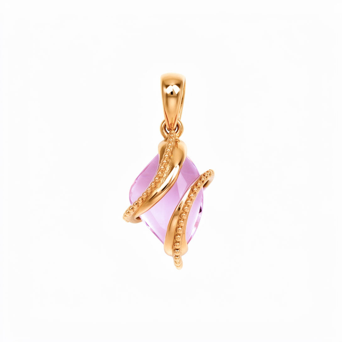 Pendant with a soft pink stone wrapped in beaded gold-plated spiral lines