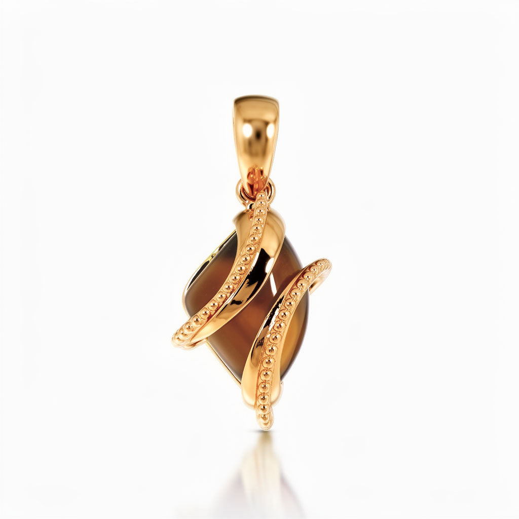 Pendant with a domed coffee-coloured stone in a double beaded gold-tone frame