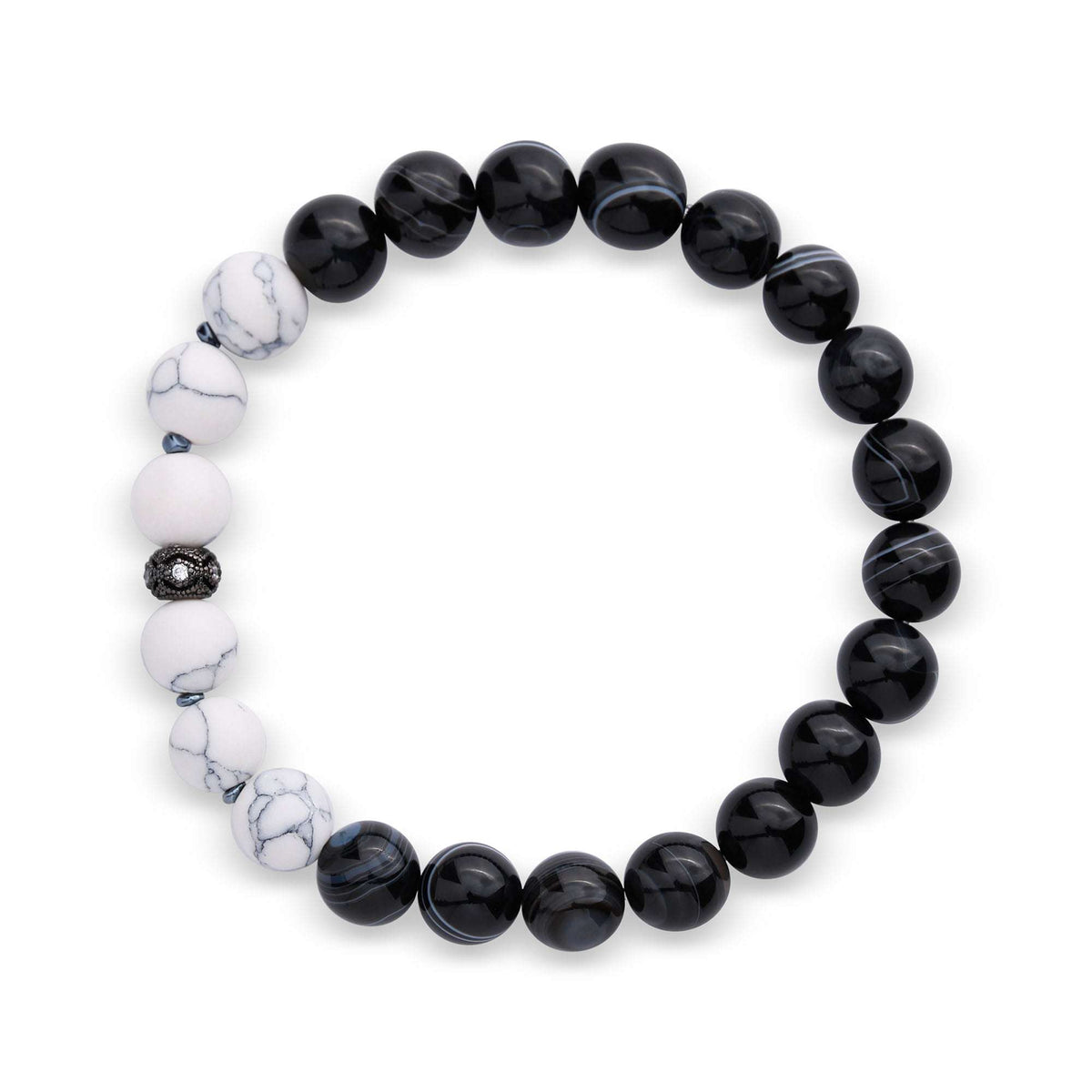 Black agate and imitation howlite stretch bracelet with a cubic zirconia spacer