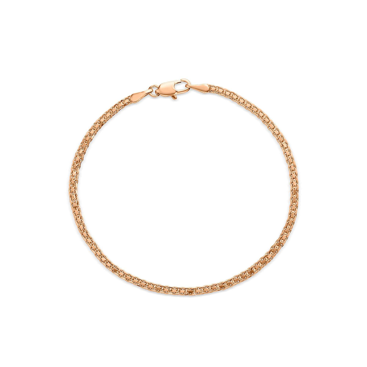 Gold | Gold-plated Bismarck bracelet with a lobster clasp, coiled on a white background